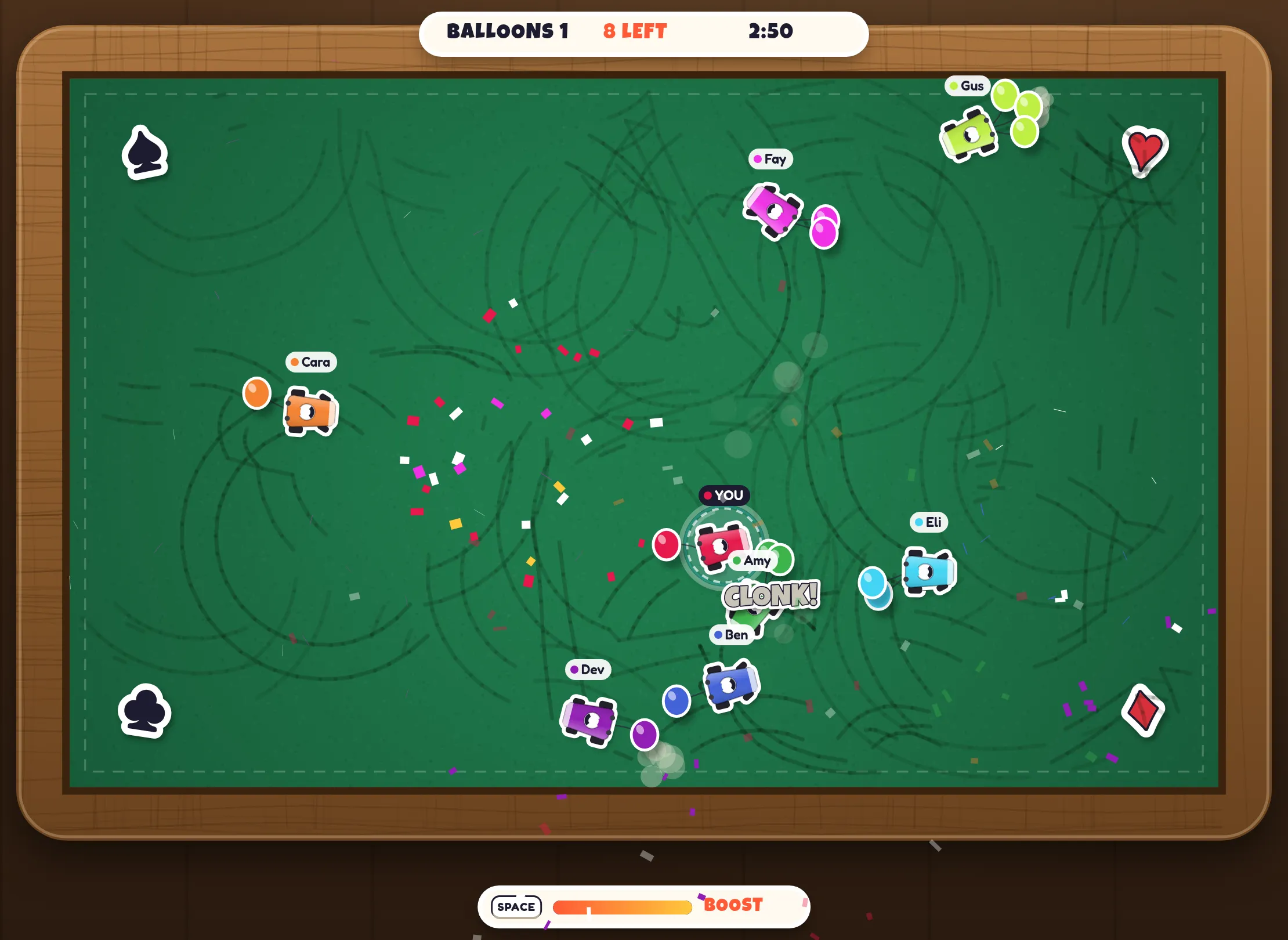Karts trailing coloured balloons bump each other around a felt arena in a burst of confetti and a CLONK!